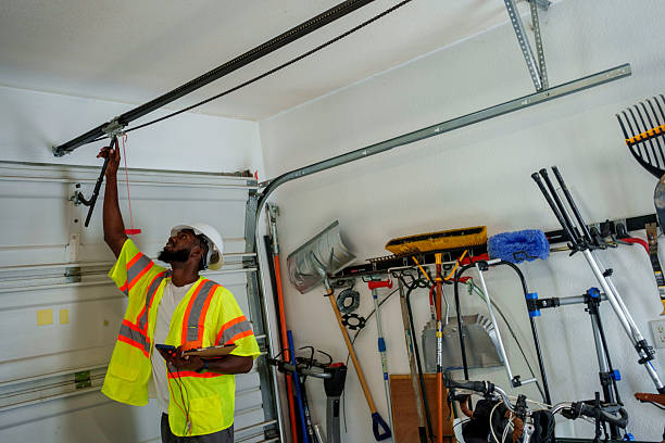 Professional Garage Door Panel Replacement technician working in Jasper County County, MS